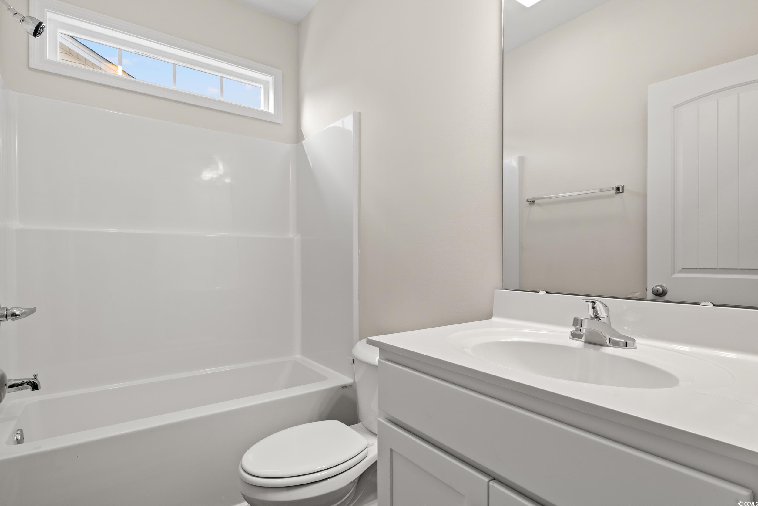109 Lakota Loop Longs, SC 29568 - Photo 18 of 20 Full bathroom with vanity, bathing tub / shower co