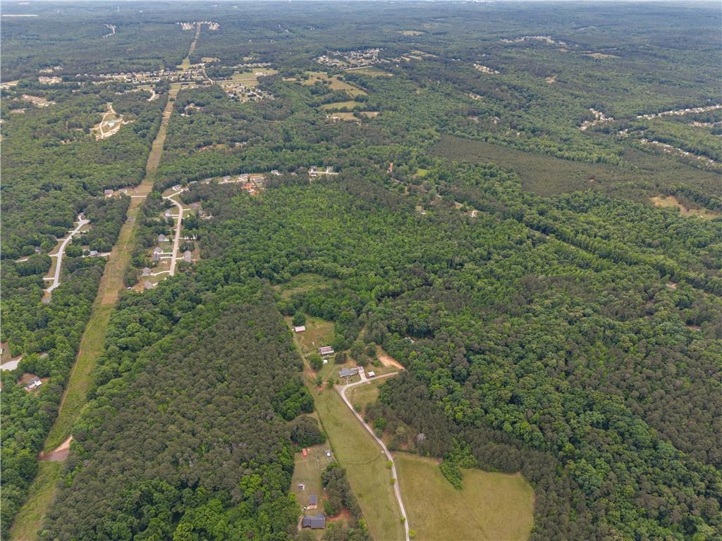 624 Bethany Road Covington, GA 30016 - Photo 3 of 4 an aerial view of a houses with yard
