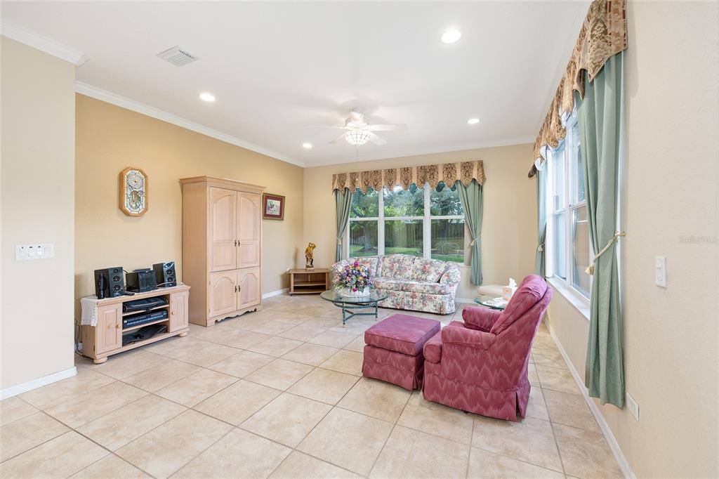 9019 Southeast 120th Loop Summerfield, FL 34491 - Photo 14 of 69 a living room with furniture