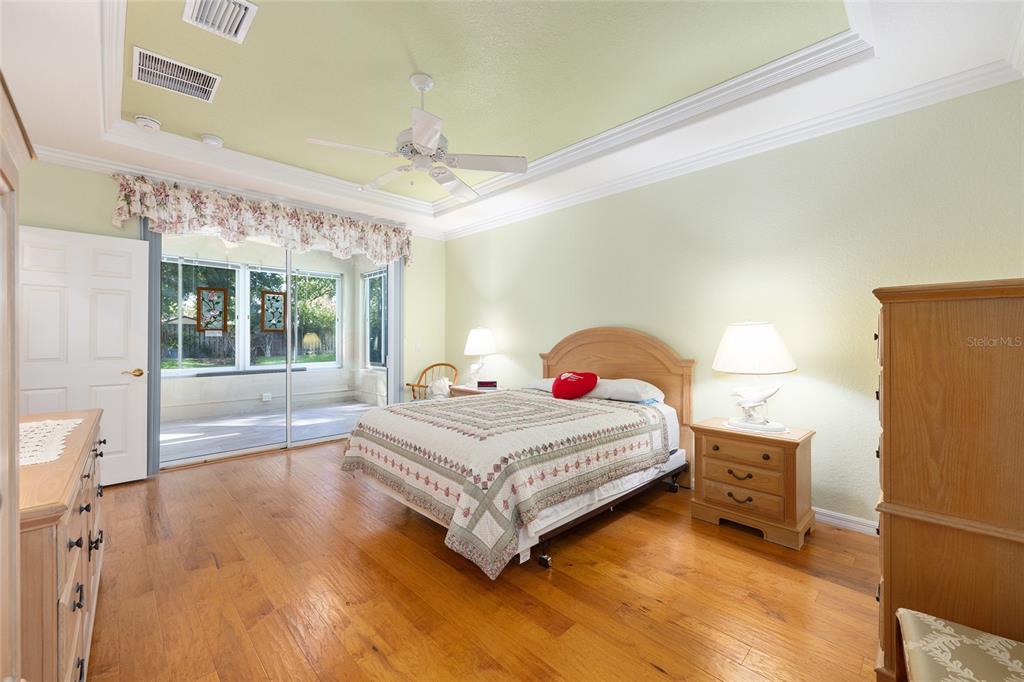 9019 Southeast 120th Loop Summerfield, FL 34491 - Photo 16 of 69 a bedroom with a bed and window