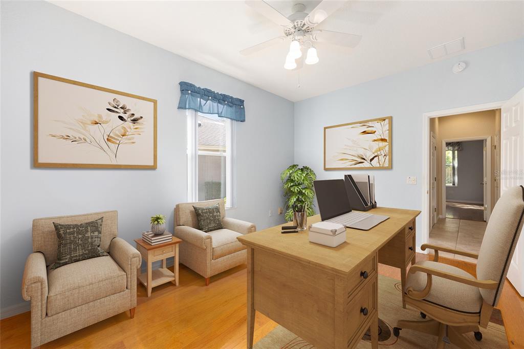 9019 Southeast 120th Loop Summerfield, FL 34491 - Photo 26 of 69 a living room with furniture and wooden floor
