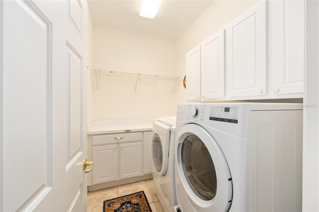 9019 Southeast 120th Loop Summerfield, FL 34491 - Photo 32 of 69 a utility room with dryer and washer