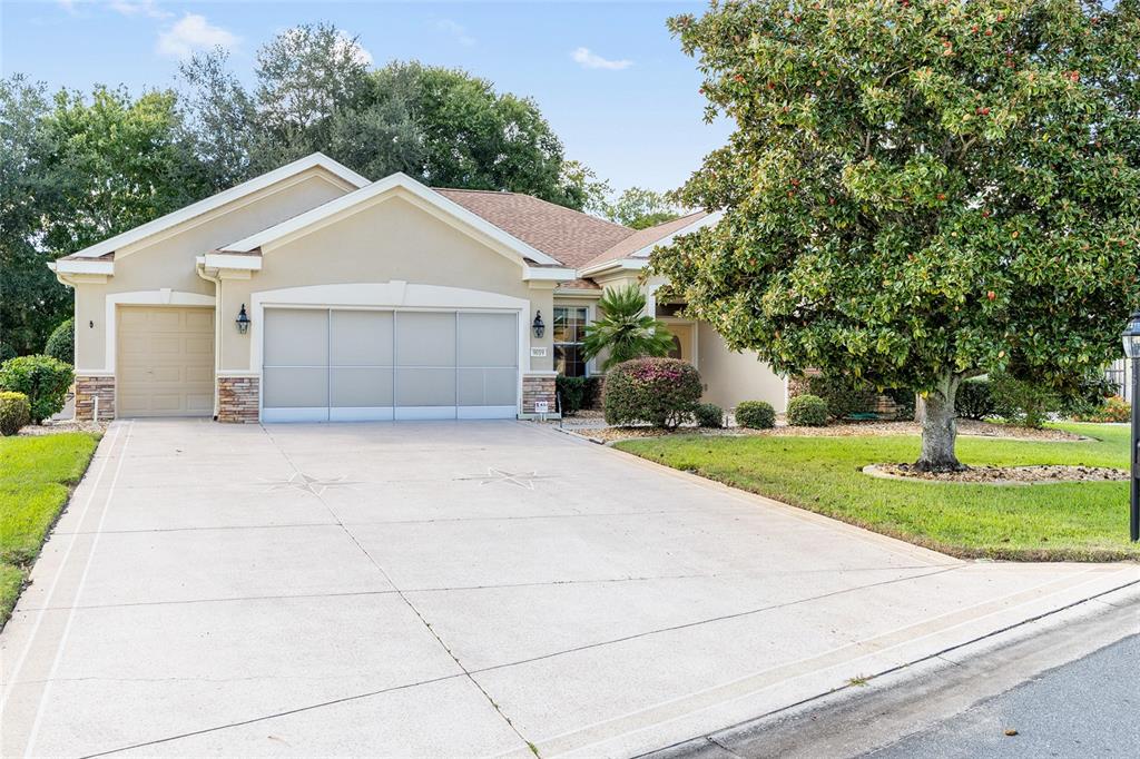9019 Southeast 120th Loop Summerfield, FL 34491 - Photo 39 of 69 a view of a house with a yard and large trees