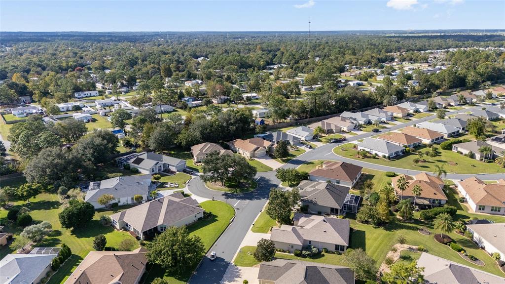 9019 Southeast 120th Loop Summerfield, FL 34491 - Photo 45 of 69 an aerial view of residential houses with outdoor space