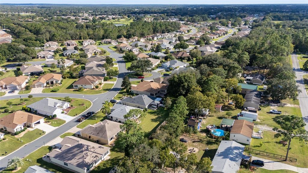 9019 Southeast 120th Loop Summerfield, FL 34491 - Photo 48 of 69 an aerial view of a city with lots of residential buildings