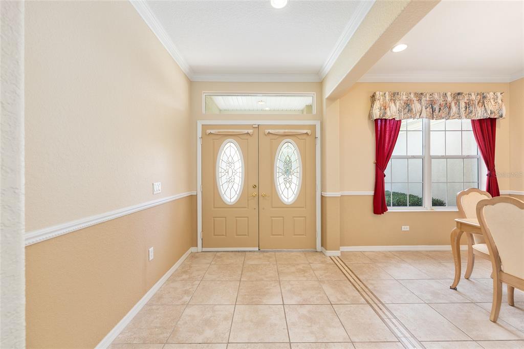 9019 Southeast 120th Loop Summerfield, FL 34491 - Photo 5 of 69 a view of front door with entryway and a window