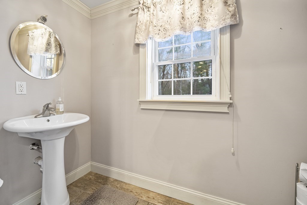 390 Cooper Road Northbridge, MA 01534 - Photo 13 of 34 a bathroom with a sink and a mirror