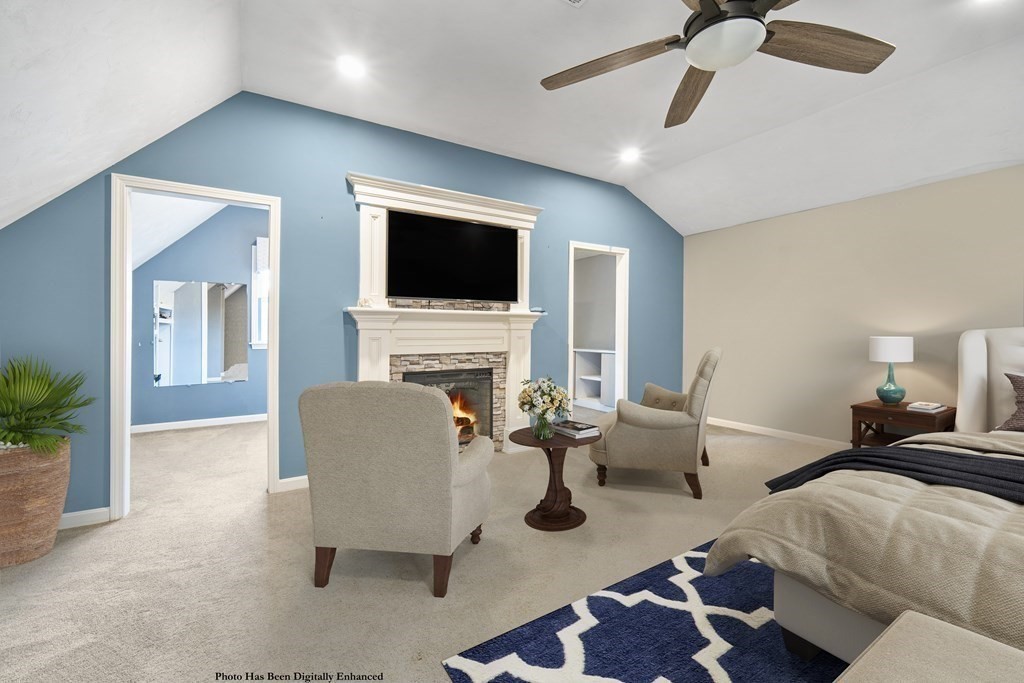 390 Cooper Road Northbridge, MA 01534 - Photo 19 of 34 a living room with furniture and a flat screen tv