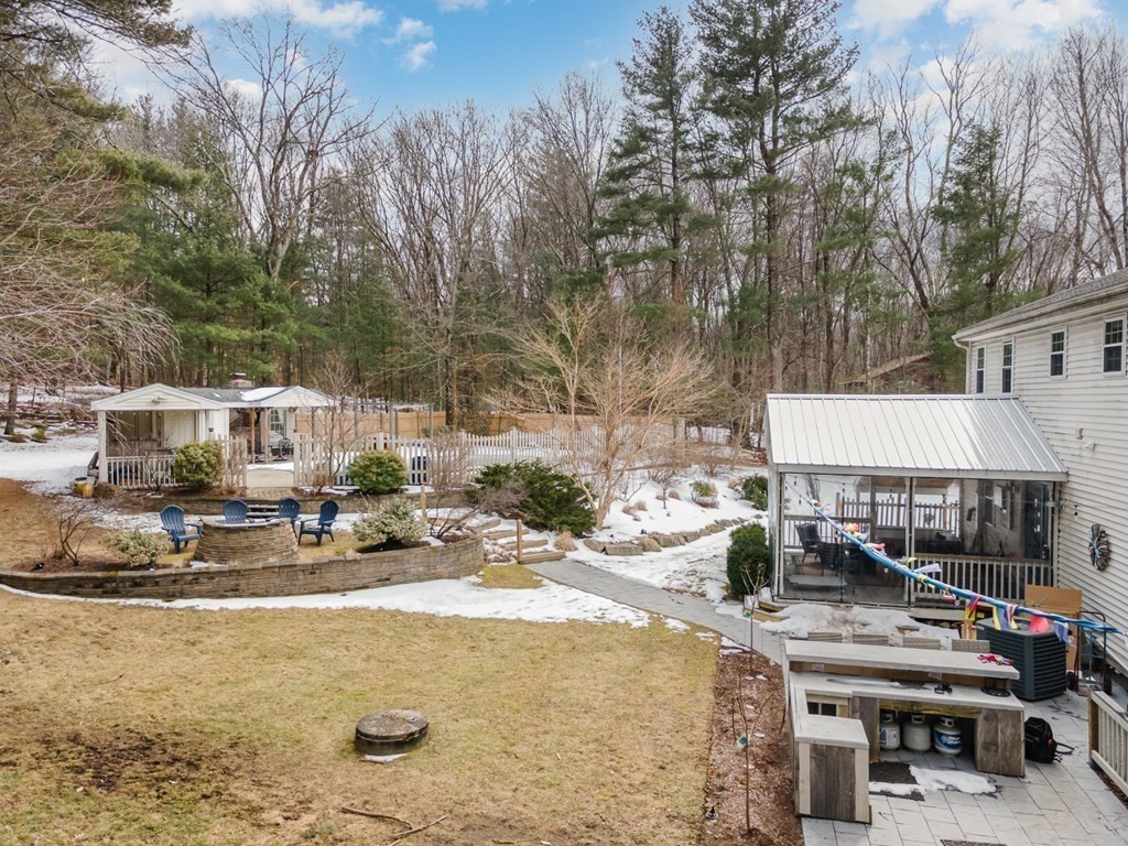 390 Cooper Road Northbridge, MA 01534 - Photo 30 of 34 a view of a house with backyard water and sitting area