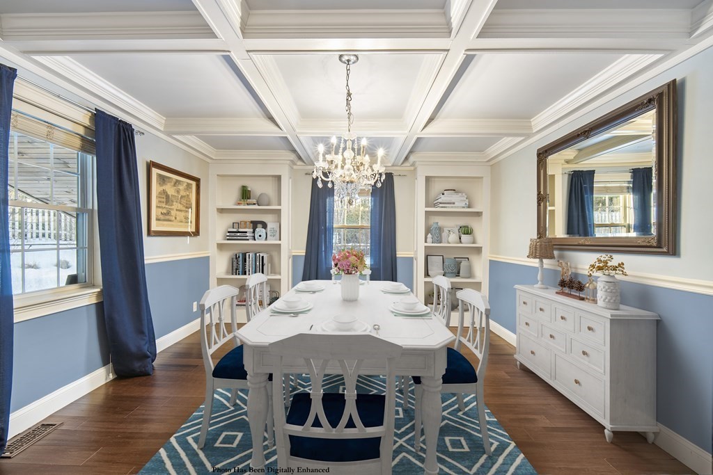 390 Cooper Road Northbridge, MA 01534 - Photo 7 of 34 a view of a dining room with furniture a chandelier and wooden floor
