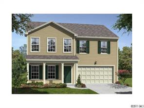 2222 Durand Road, Unit 53 Fort Mill, SC 29715 - Photo 1 of 1 a front view of a house with a yard