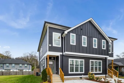 a front view of a building with garden