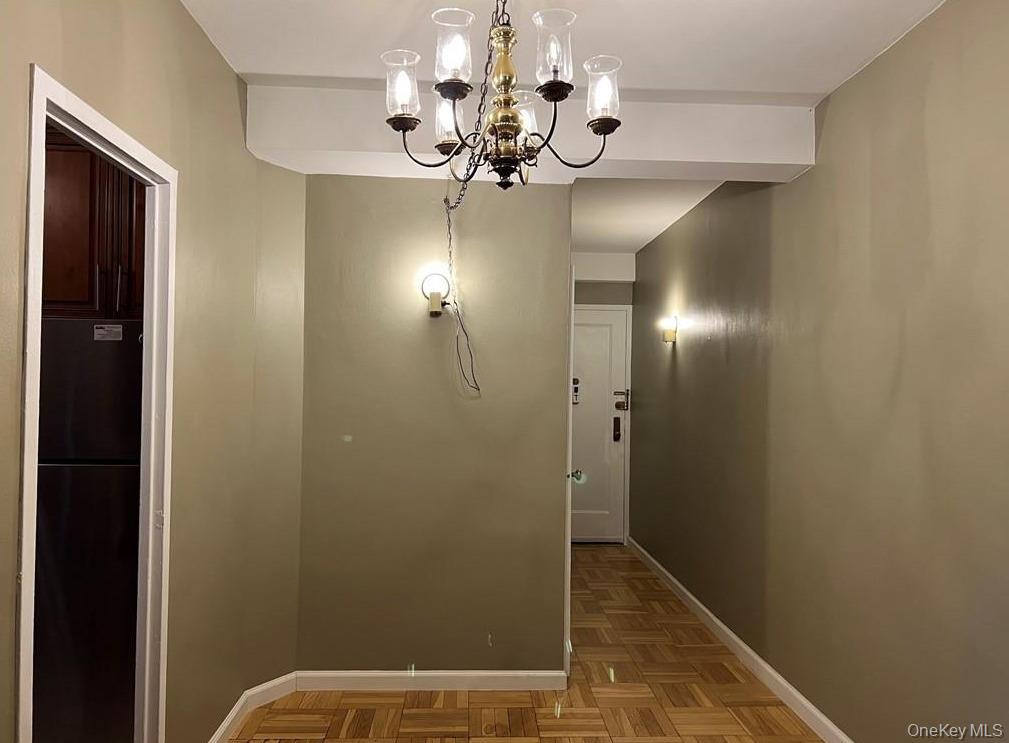 1735 Purdy Street, Unit 2B Bronx, NY 10462 - Photo 4 of 6 a view of a livingroom with a chandelier