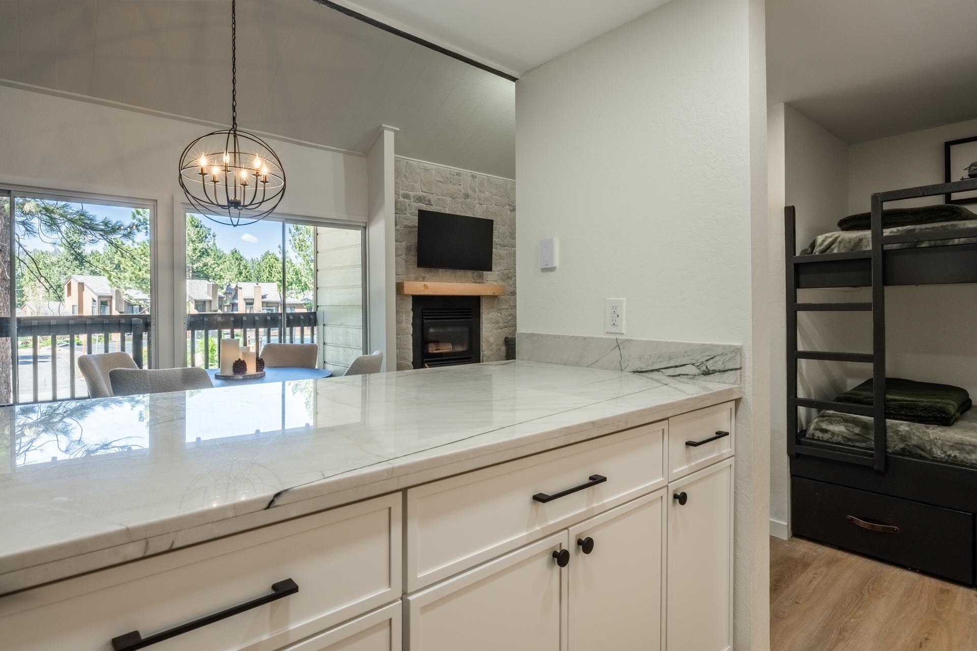 2289 Sierra Nevada Road, Unit F15 Mammoth Lakes, CA 93546 - Photo 11 of 44 a open kitchen with a sink and a window