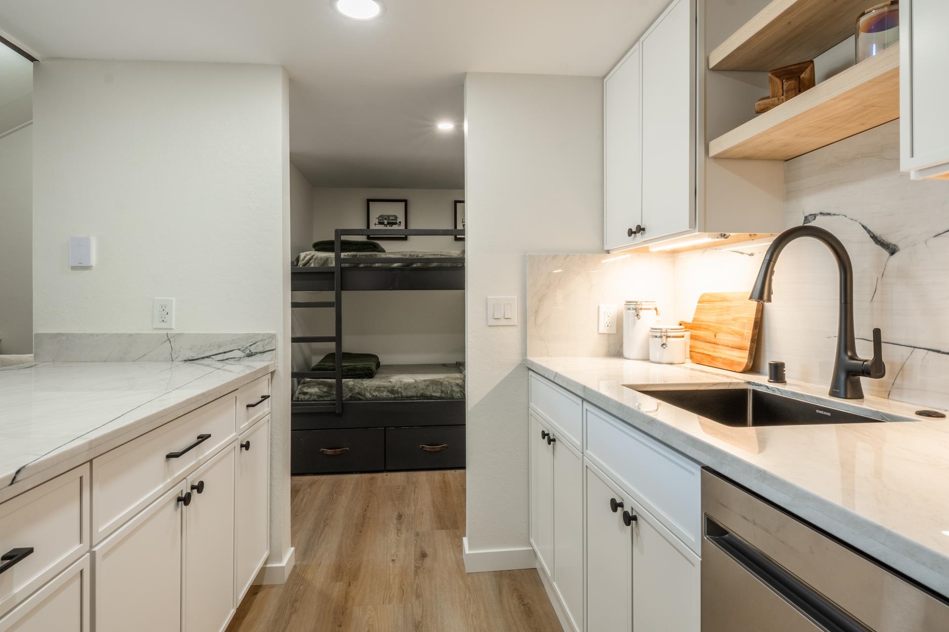 2289 Sierra Nevada Road, Unit F15 Mammoth Lakes, CA 93546 - Photo 12 of 44 a kitchen with a sink and cabinets