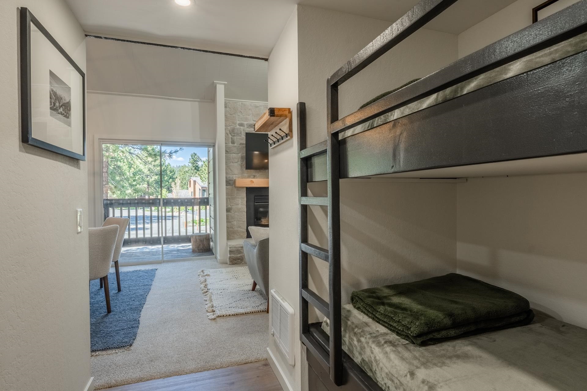 2289 Sierra Nevada Road, Unit F15 Mammoth Lakes, CA 93546 - Photo 17 of 44 a kitchen with a refrigerator and a stove