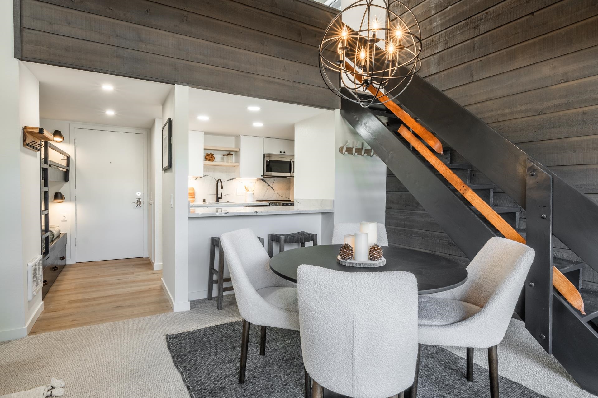 2289 Sierra Nevada Road, Unit F15 Mammoth Lakes, CA 93546 - Photo 21 of 44 a dining room with furniture and wooden floor