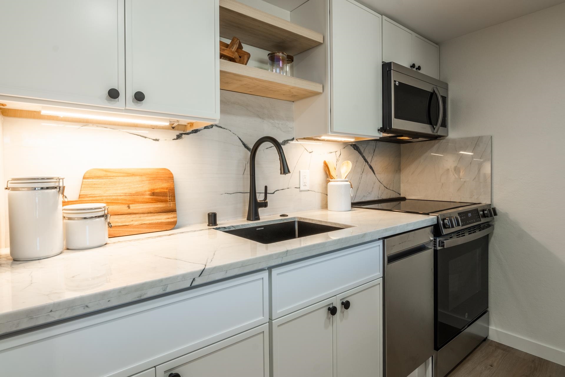 2289 Sierra Nevada Road, Unit F15 Mammoth Lakes, CA 93546 - Photo 8 of 44 a kitchen with a sink and cabinets