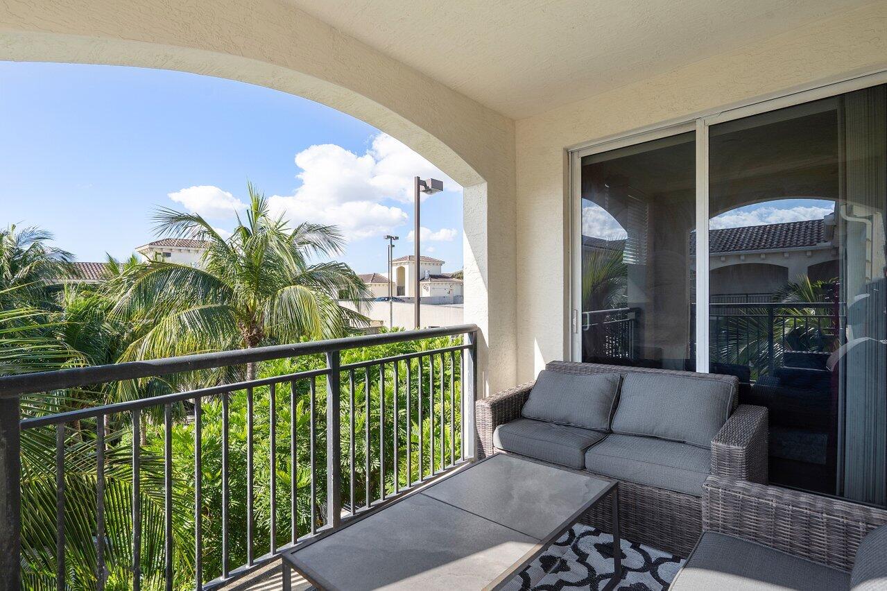 1 Renaissance Way, Unit 416 Boynton Beach, FL 33426 - Photo 14 of 31 a living room with furniture