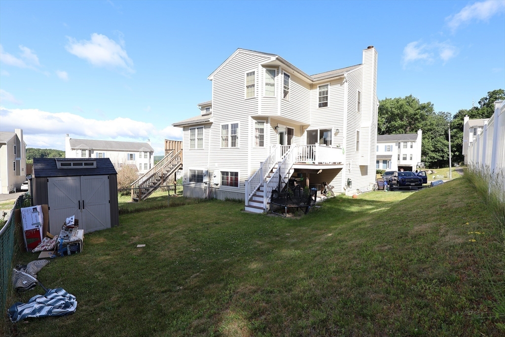 74 Sophia Drive Worcester, MA 01607 - Photo 12 of 15 a view of a house with a yard