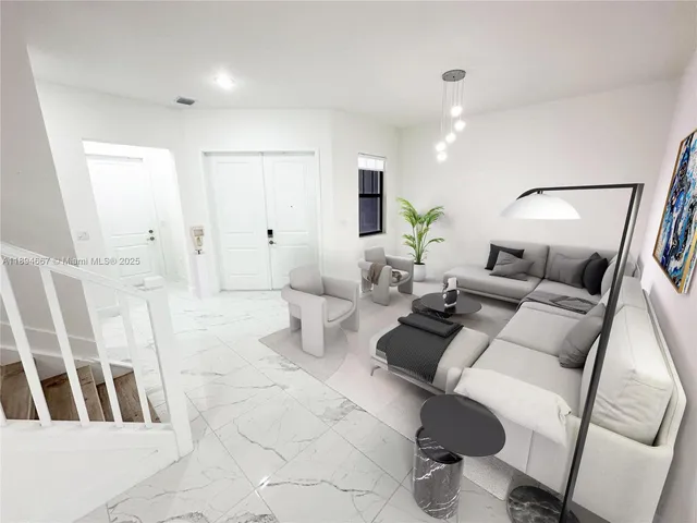 a living room with furniture and a table