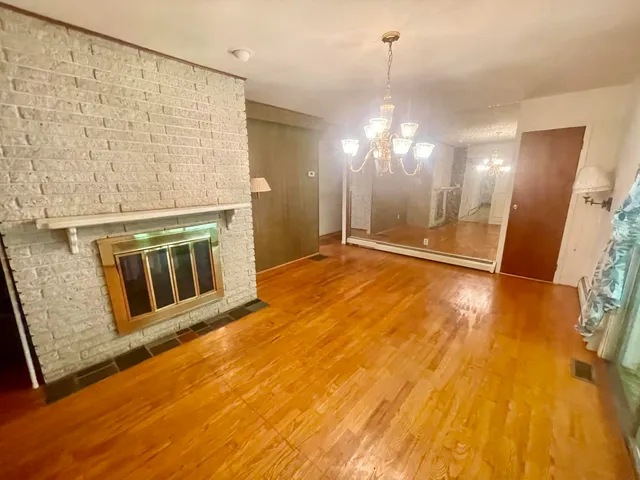 a view of a bathroom with a bathtub
