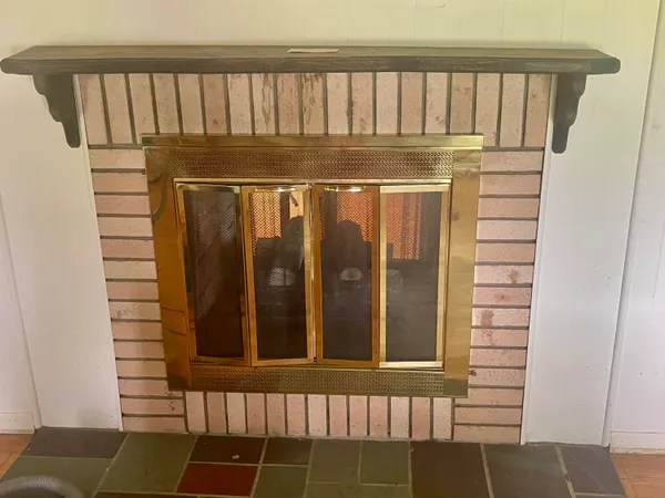 a view of a livingroom with a fireplace