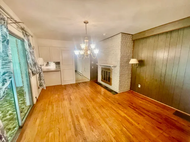 a room with a bed and a window