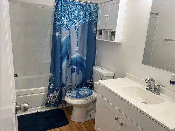 a bathroom with a toilet and a sink