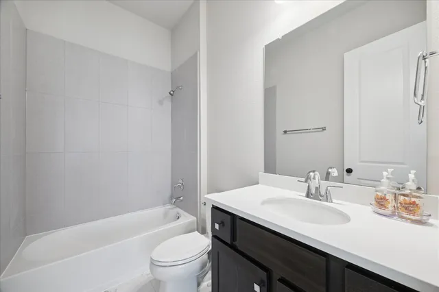 a view of a house with yard and front view of a house