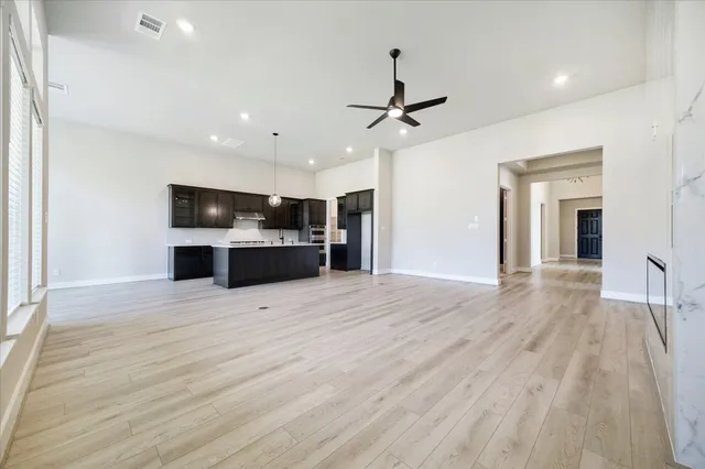 a view of a kitchen with a sink and a kitchen