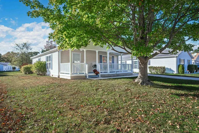 a house view with a garden space