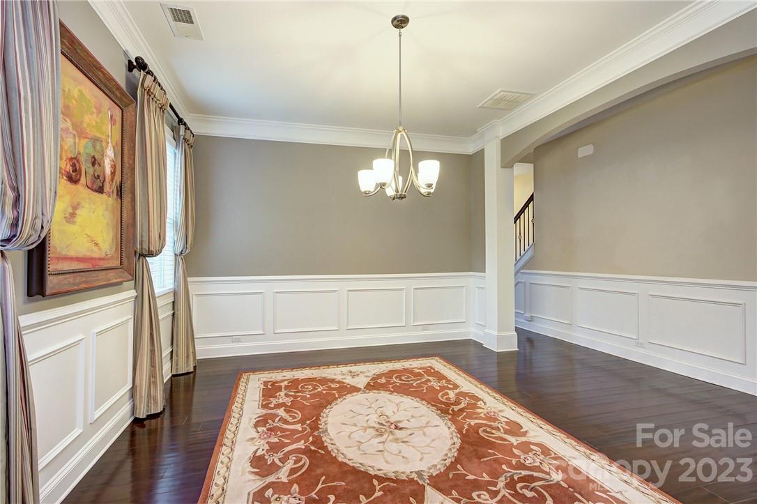 160 Kentmere Lane Clover, SC 29710 - Photo 11 of 37 a view of a hallway with wooden floor and staircase