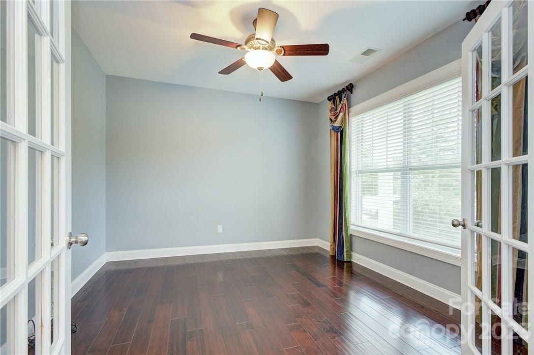 160 Kentmere Lane Clover, SC 29710 - Photo 13 of 37 a view of room with window ceiling fan and hardwood floor
