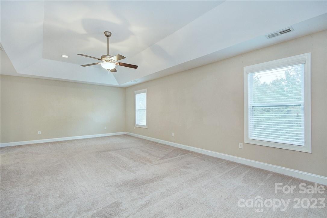160 Kentmere Lane Clover, SC 29710 - Photo 33 of 37 an empty room with a window and a ceiling fan