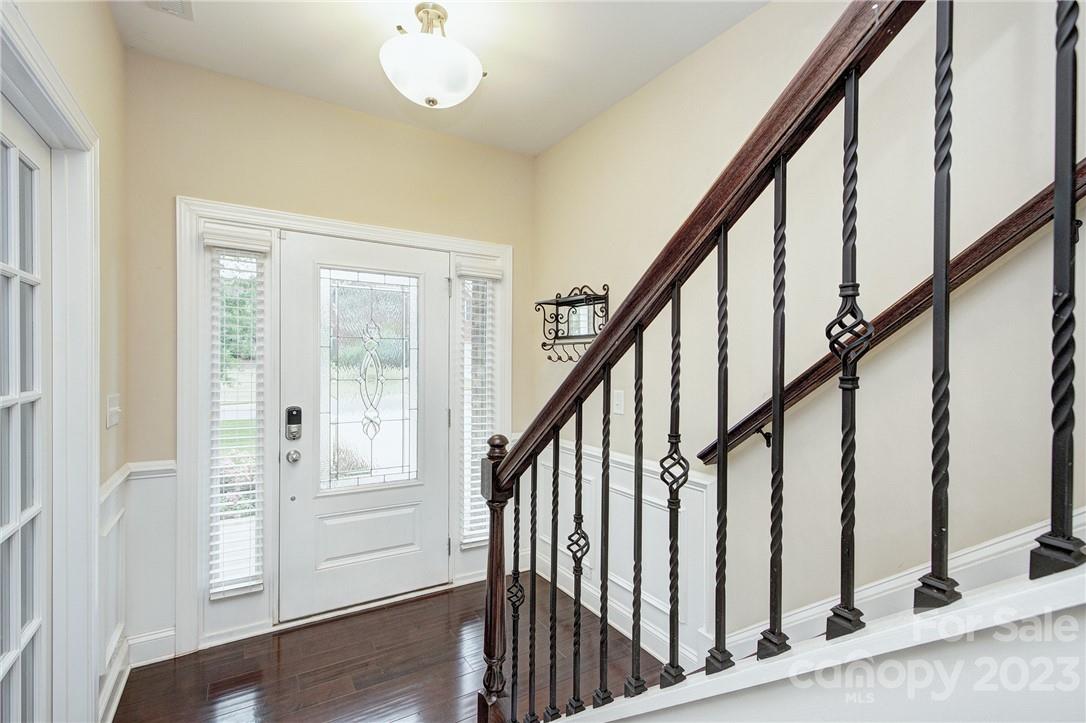 160 Kentmere Lane Clover, SC 29710 - Photo 4 of 37 a view of an entryway with wooden floor and stairs