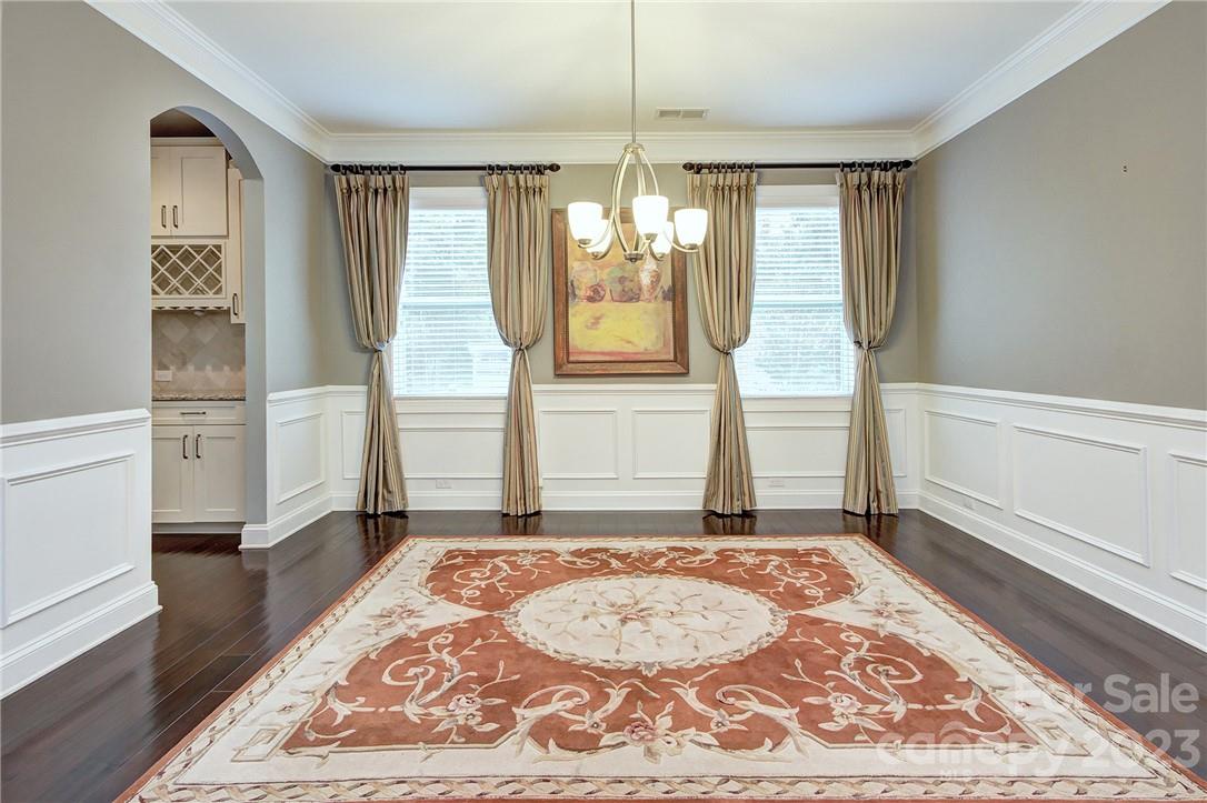 160 Kentmere Lane Clover, SC 29710 - Photo 10 of 37 a view of a hallway with windows and chandelier
