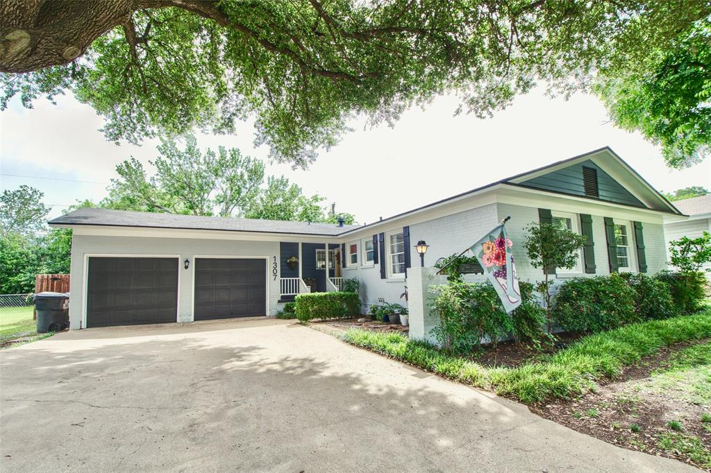 1307 North 65th Street Waco, TX 76710 - Photo 1 of 35 front view of a house with a yard
