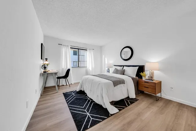 a bathroom with a double vanity sink and mirror