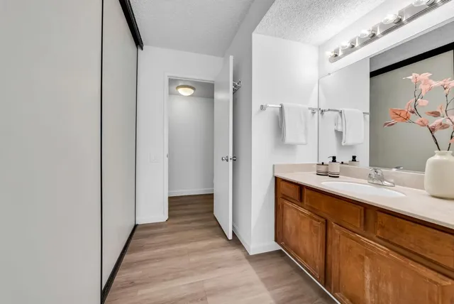 a view of yard with swimming pool and trees