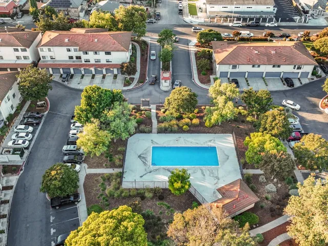 an aerial view of residential building and city view