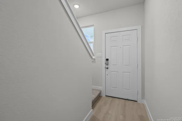 a view of hallway with stairs
