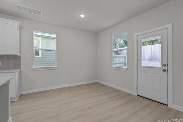 an empty room with windows