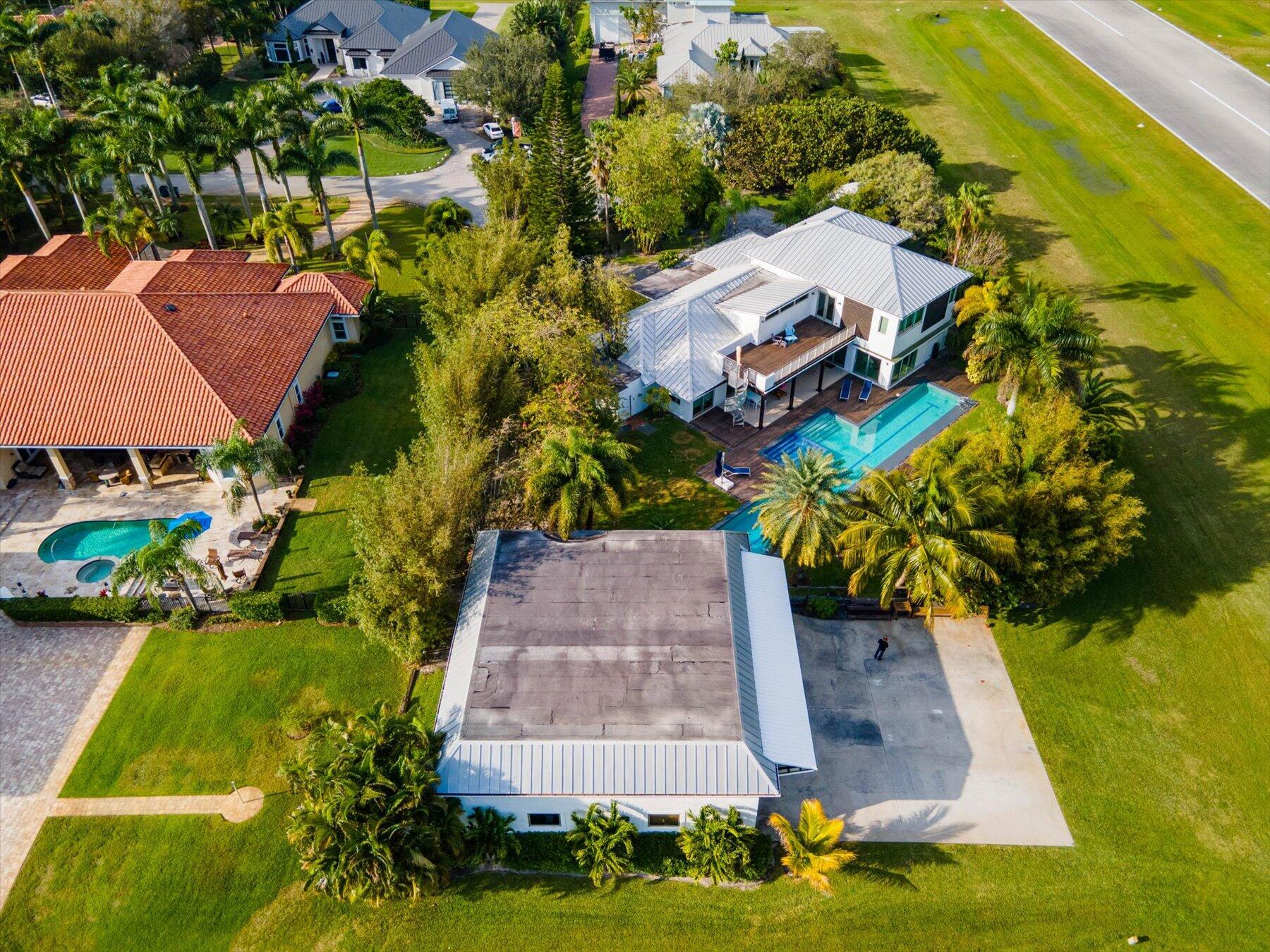 15720 Weatherly Road Wellington, FL 33414 - Photo 4 of 44 85-DJI_0842-Edit