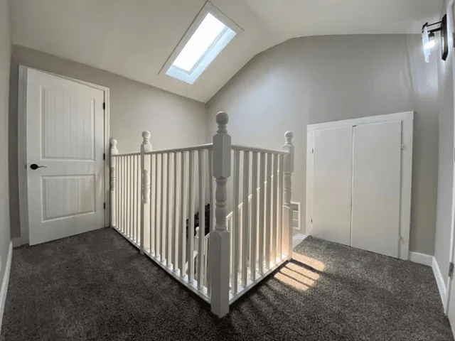 a view of a hallway with entryway