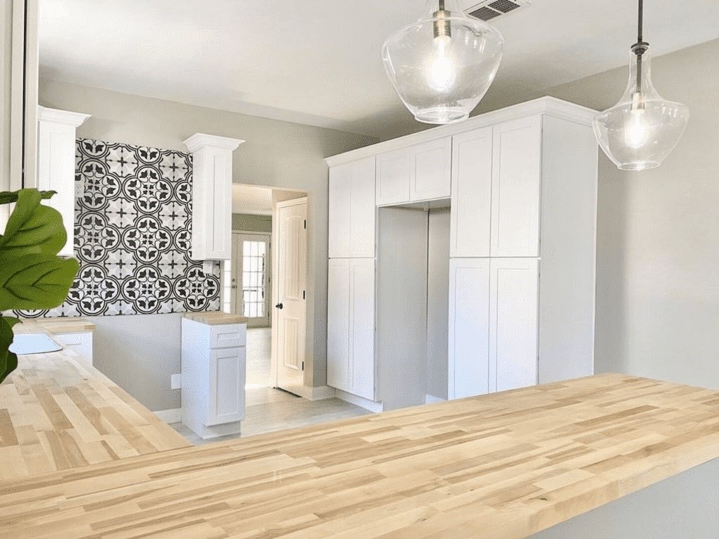 6716 Jefferson Boulevard Groves, TX 77619 - Photo 13 of 34 a view of kitchen and empty room