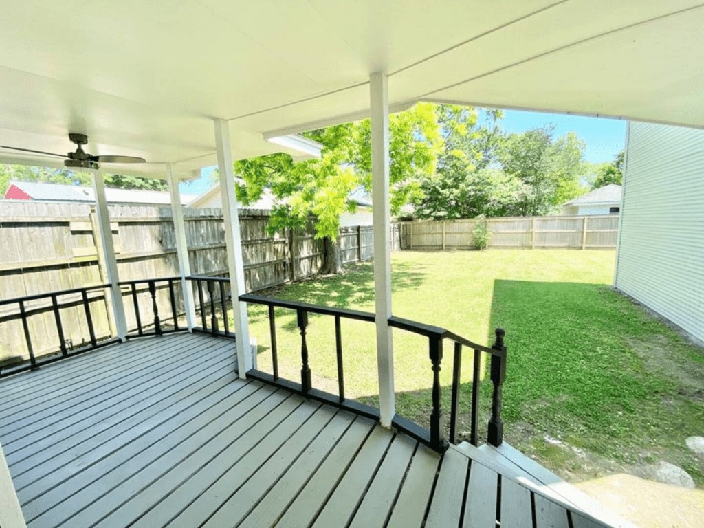 6716 Jefferson Boulevard Groves, TX 77619 - Photo 33 of 34 a view of a balcony with wooden floor
