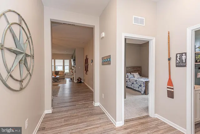 a view of a livingroom from a hallway