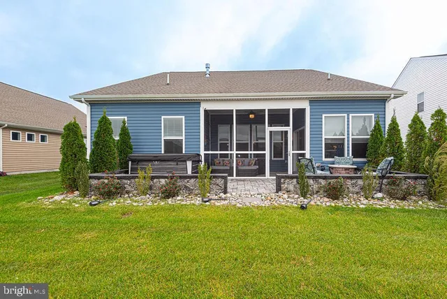 a front view of a house with patio