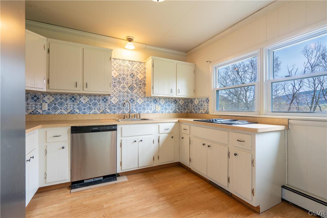 1234 Sunset Circle Slatington, PA 18080 - Photo 12 of 40 a kitchen with granite countertop white cabinets and white appliances